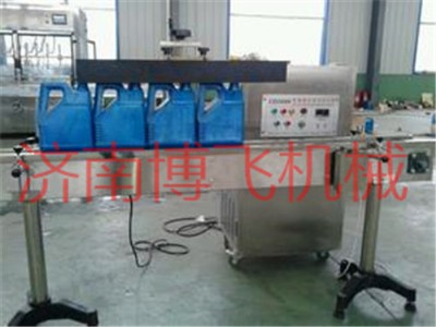 冷凍機(jī)油高產(chǎn)能鋁箔封口機(jī)ar工業(yè)用油瓶口薄膜封口機(jī)％￥